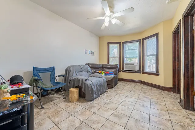 a living room with furniture and a window