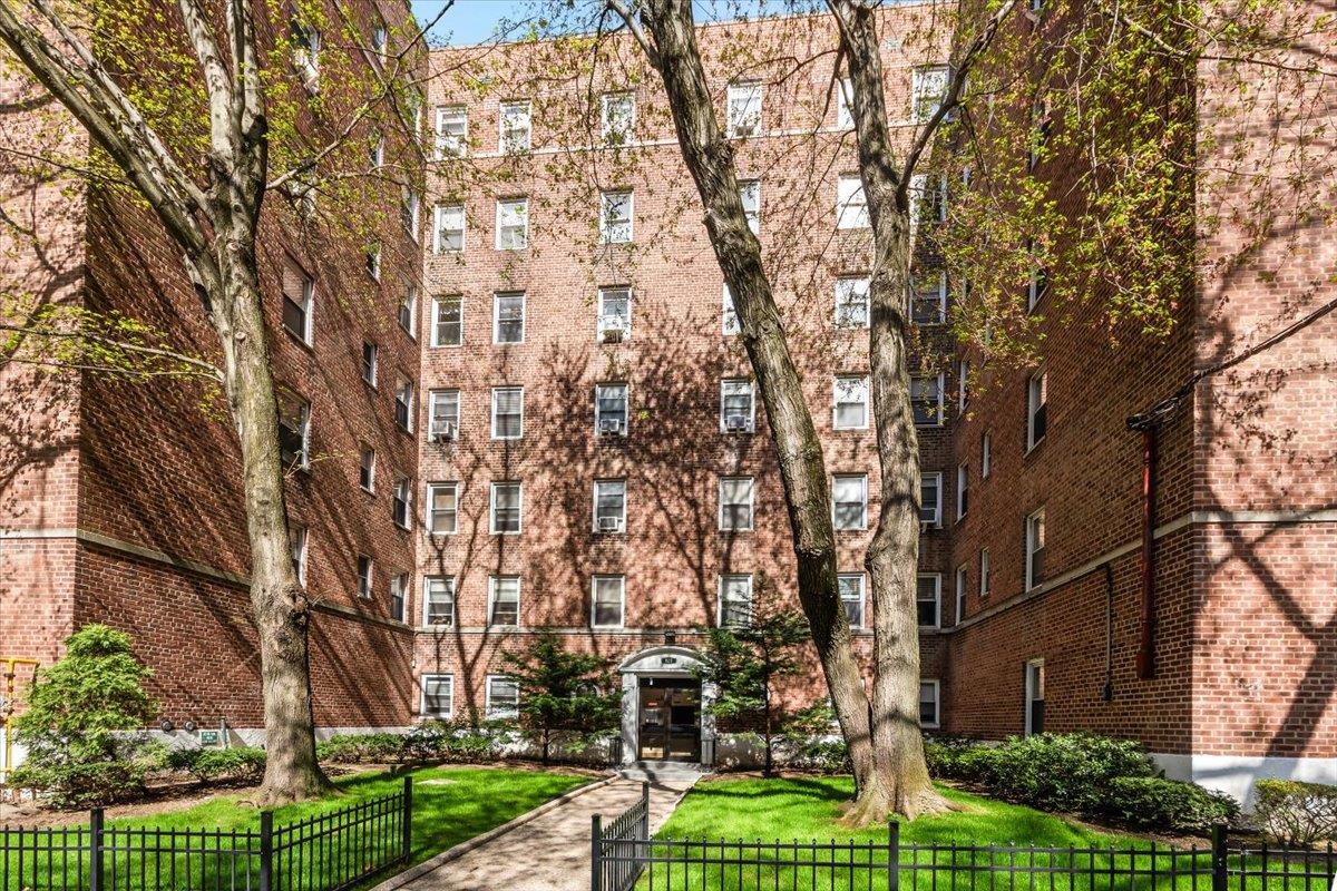 821 Bronx River Road, Unit 6F Bronxville, NY 10708 - Photo 1 of 1 Entry view of property with fenced front yard