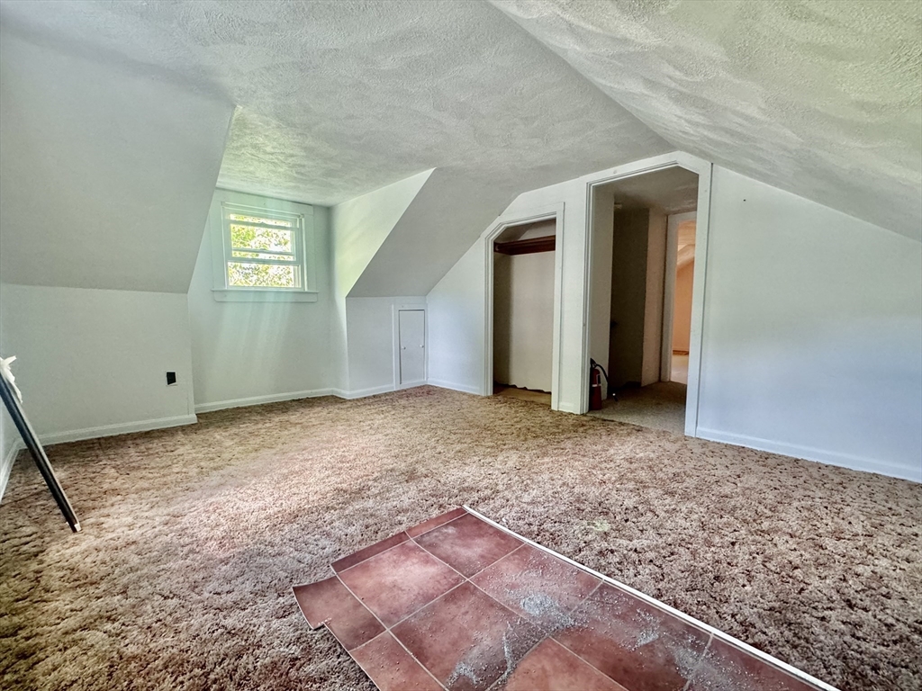 10 Beech Street Billerica, MA 01821 - Photo 15 of 21 a view of an empty room and window
