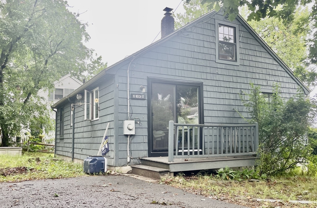10 Beech Street Billerica, MA 01821 - Photo 18 of 21 a front view of a house with garden