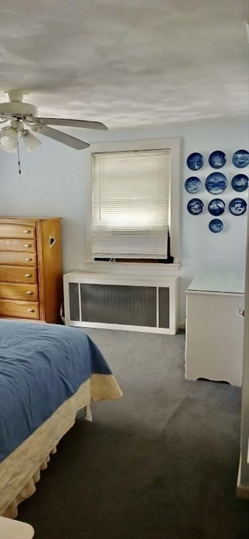 10 Beech Street Billerica, MA 01821 - Photo 9 of 21 a bedroom with a bed and a table