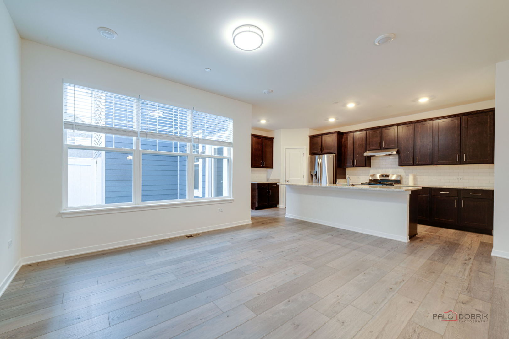 356 Hoffmann Drive Buffalo Grove, IL 60089 - Photo 11 of 35 a view of kitchen with wooden floor and electronic appliances