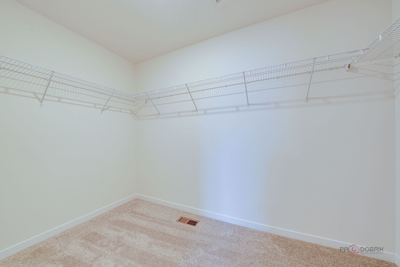 356 Hoffmann Drive Buffalo Grove, IL 60089 - Photo 21 of 35 a view of a room with racks on the wall
