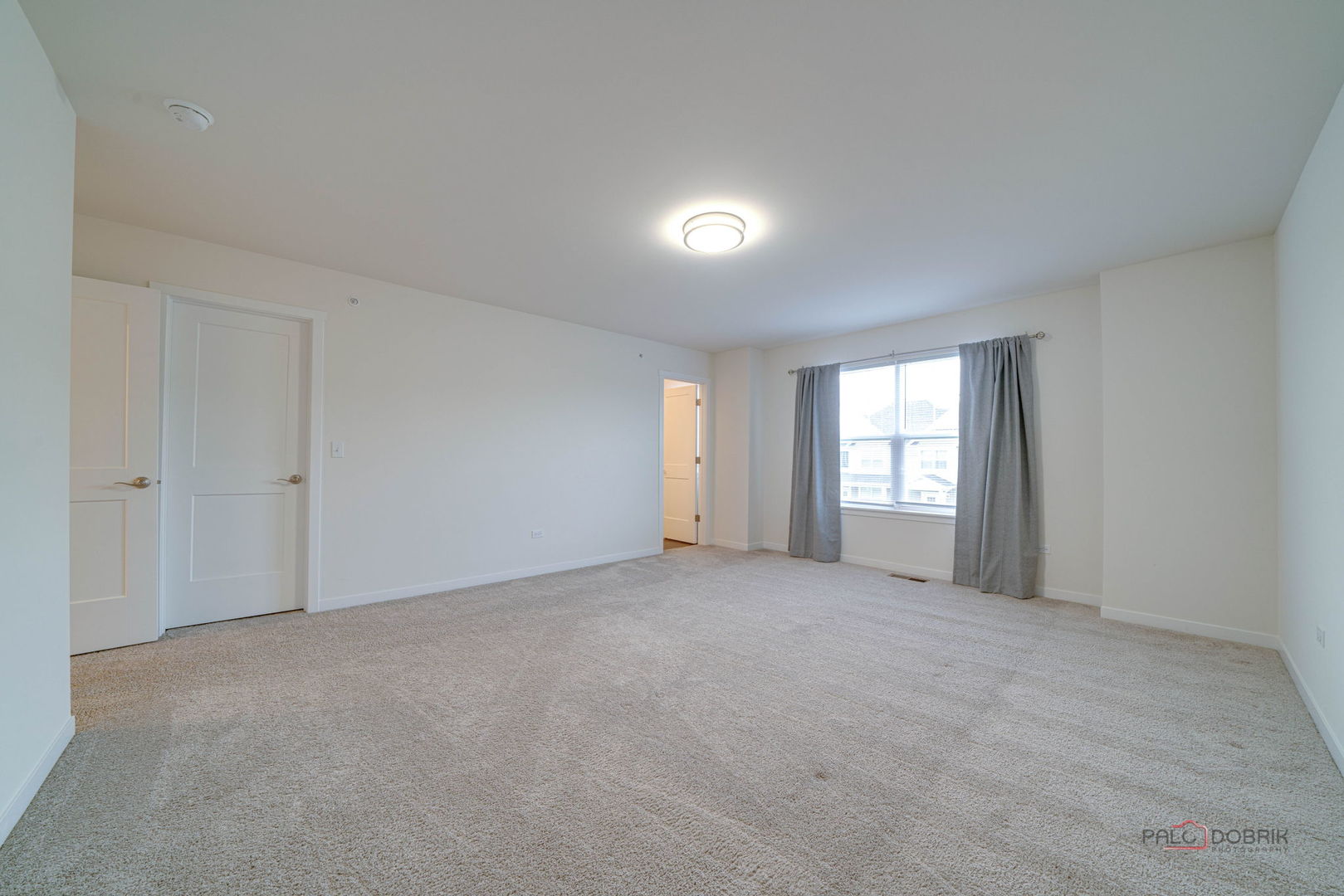 356 Hoffmann Drive Buffalo Grove, IL 60089 - Photo 22 of 35 a view of an empty room with a window