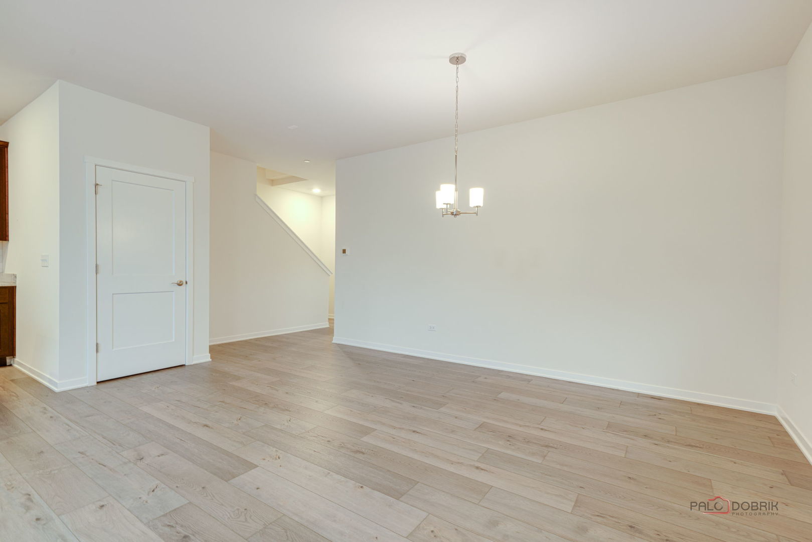 356 Hoffmann Drive Buffalo Grove, IL 60089 - Photo 10 of 35 an empty room with wooden floor and ceiling fan