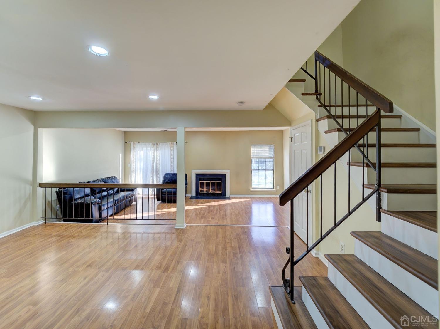 3802 Cricket Circle Edison, NJ 08820 - Photo 11 of 26 a view of a livingroom with furniture stairs