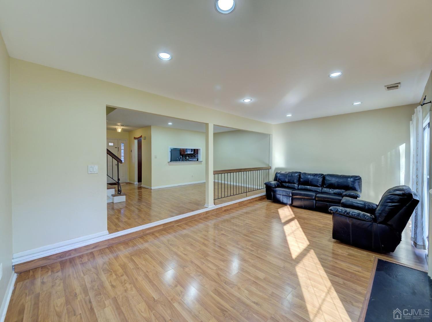 3802 Cricket Circle Edison, NJ 08820 - Photo 15 of 26 a view of a livingroom with furniture and wooden floor