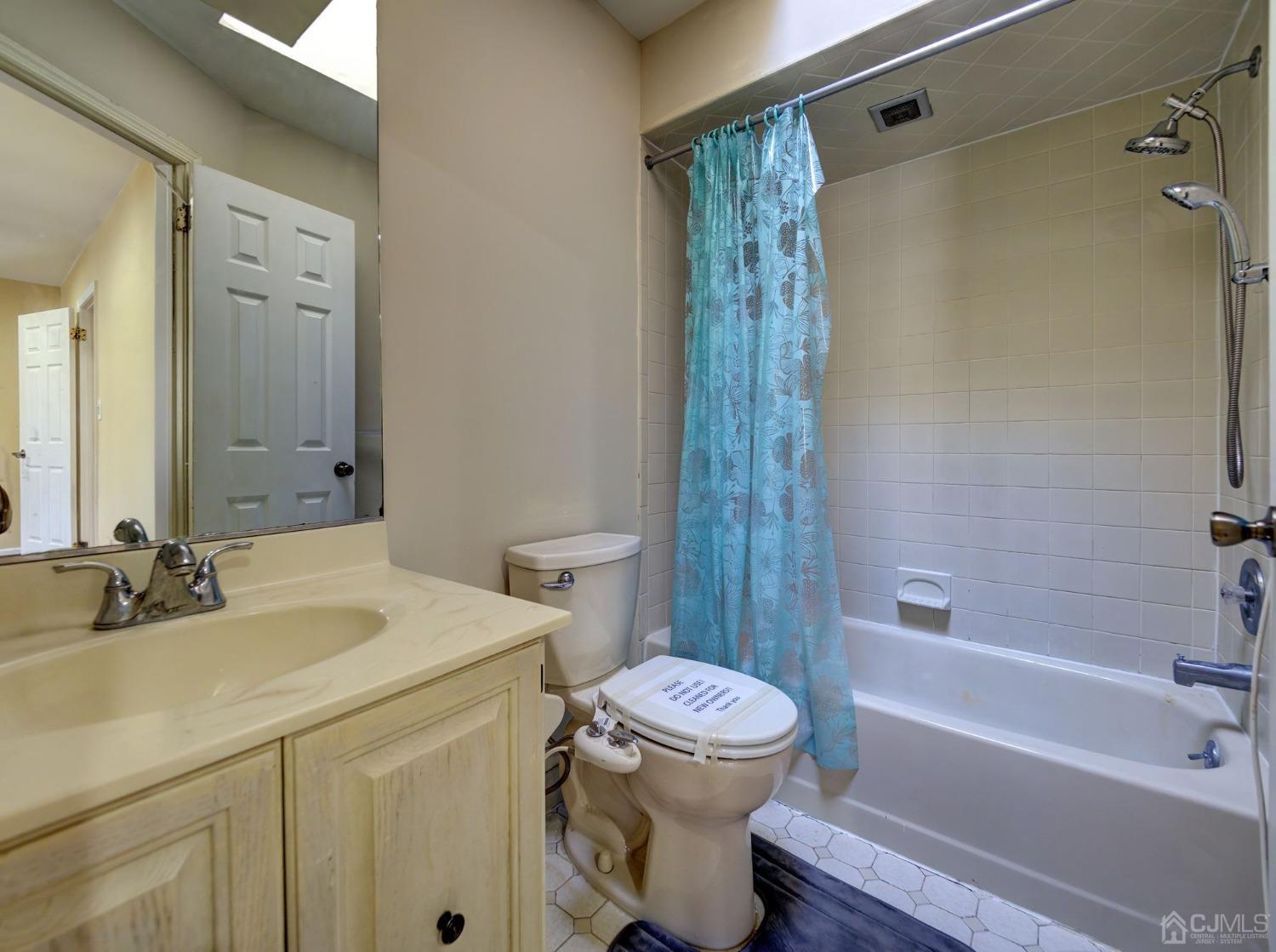 3802 Cricket Circle Edison, NJ 08820 - Photo 21 of 26 a bathroom with a sink toilet and shower
