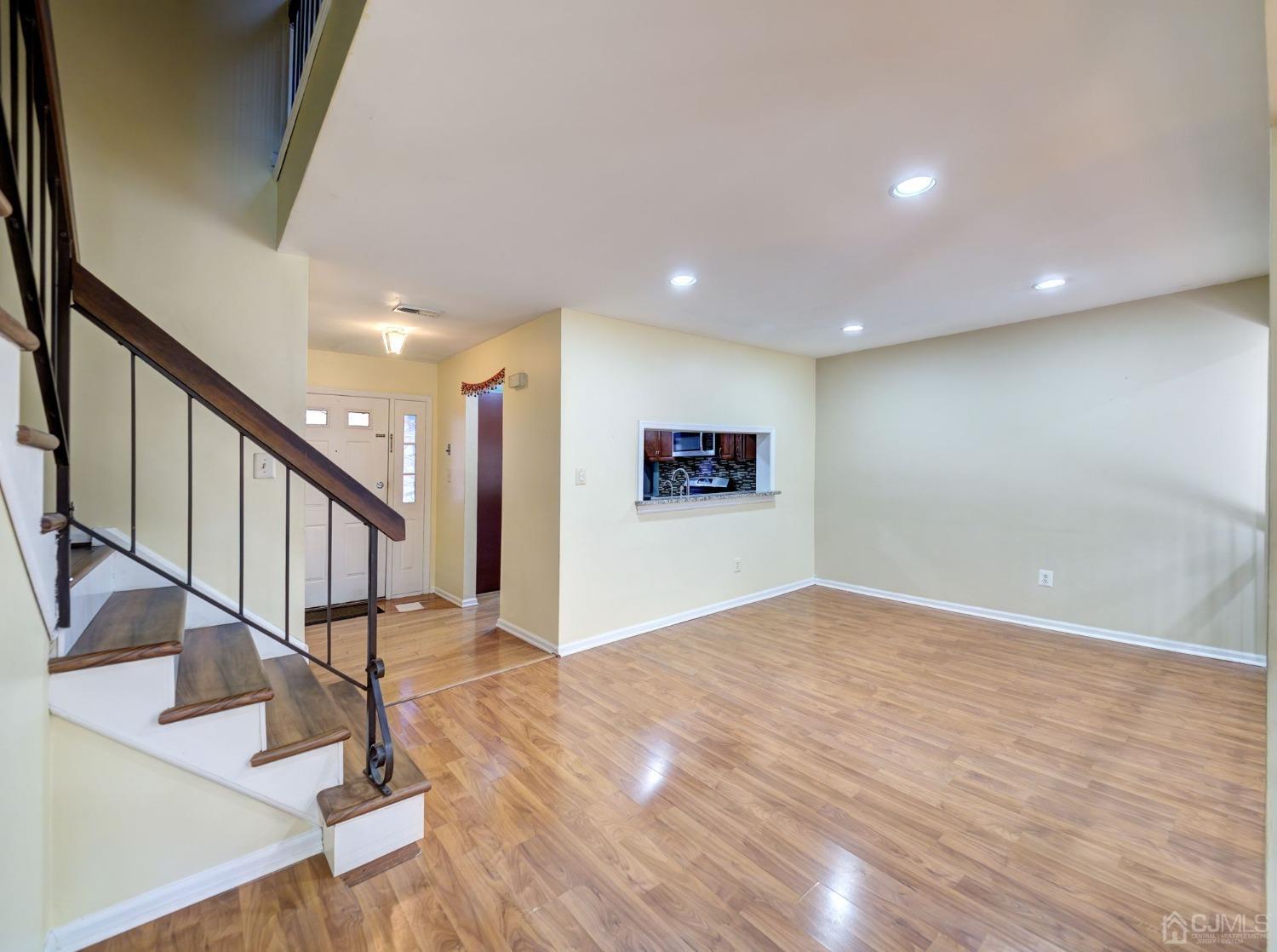 3802 Cricket Circle Edison, NJ 08820 - Photo 10 of 26 a view of entryway and hall with wooden floor