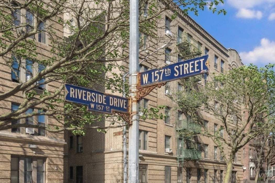790 Riverside Drive, Unit 1J Manhattan, NY 10032 - Photo 12 of 22 a street sign on a pole on a street