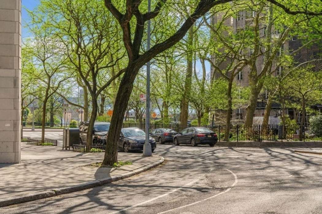 790 Riverside Drive, Unit 1J Manhattan, NY 10032 - Photo 13 of 22 a view of street with large trees