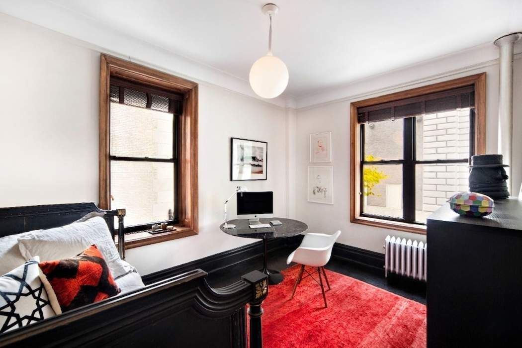 790 Riverside Drive, Unit 1J Manhattan, NY 10032 - Photo 8 of 22 a room with furniture and window