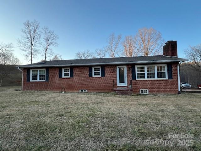 2639 Fairview Road Marion, NC 28752 - Photo 1 of 42 a front view of a house with a garden