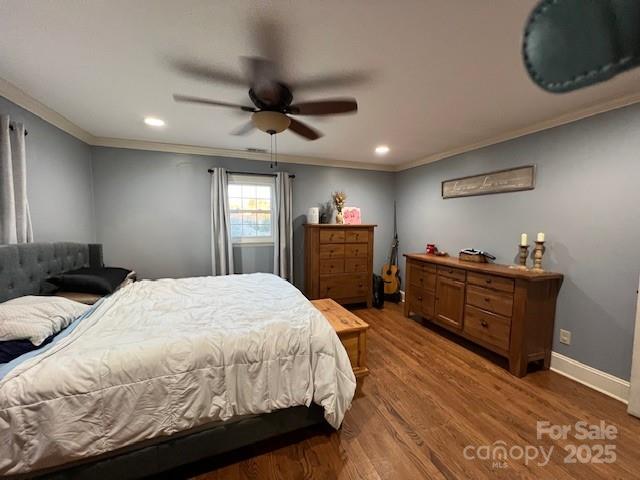 2639 Fairview Road Marion, NC 28752 - Photo 22 of 42 a bed room with a bed and a dresser