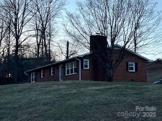 2639 Fairview Road Marion, NC 28752 - Photo 3 of 42 a front view of house with yard and green space