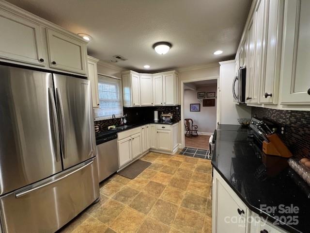 2639 Fairview Road Marion, NC 28752 - Photo 6 of 42 a kitchen with granite countertop a refrigerator stove top oven and sink