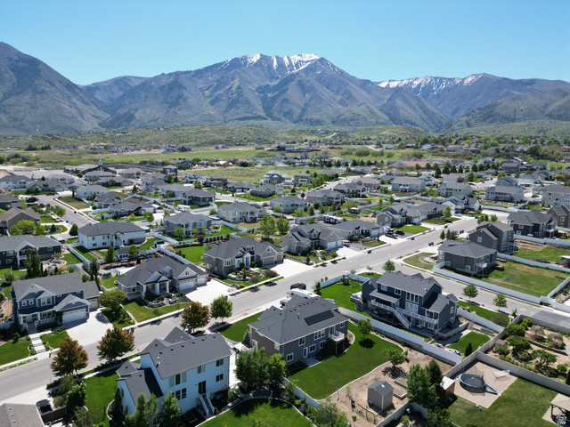 1145 North Christley Lane, Unit 48 Elk Ridge, UT 84651 - Photo 38 of 38 Expansive residential development featuring numerous single-family homes with pitched roofs and manicured lawns
