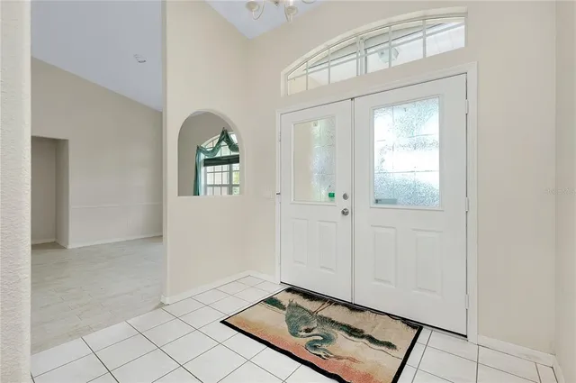 a view of a kitchen with a sink and a window