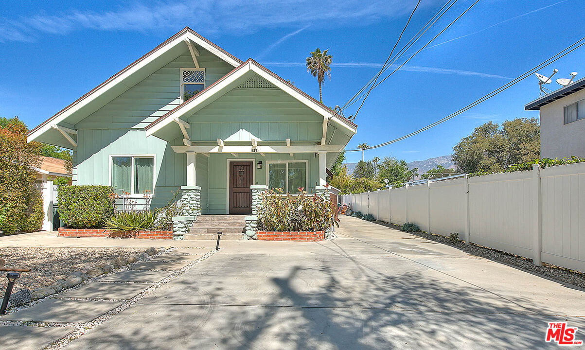 283 West Howard Street Pasadena, CA 91103 - Photo 21 of 21 a front view of a house with a yard