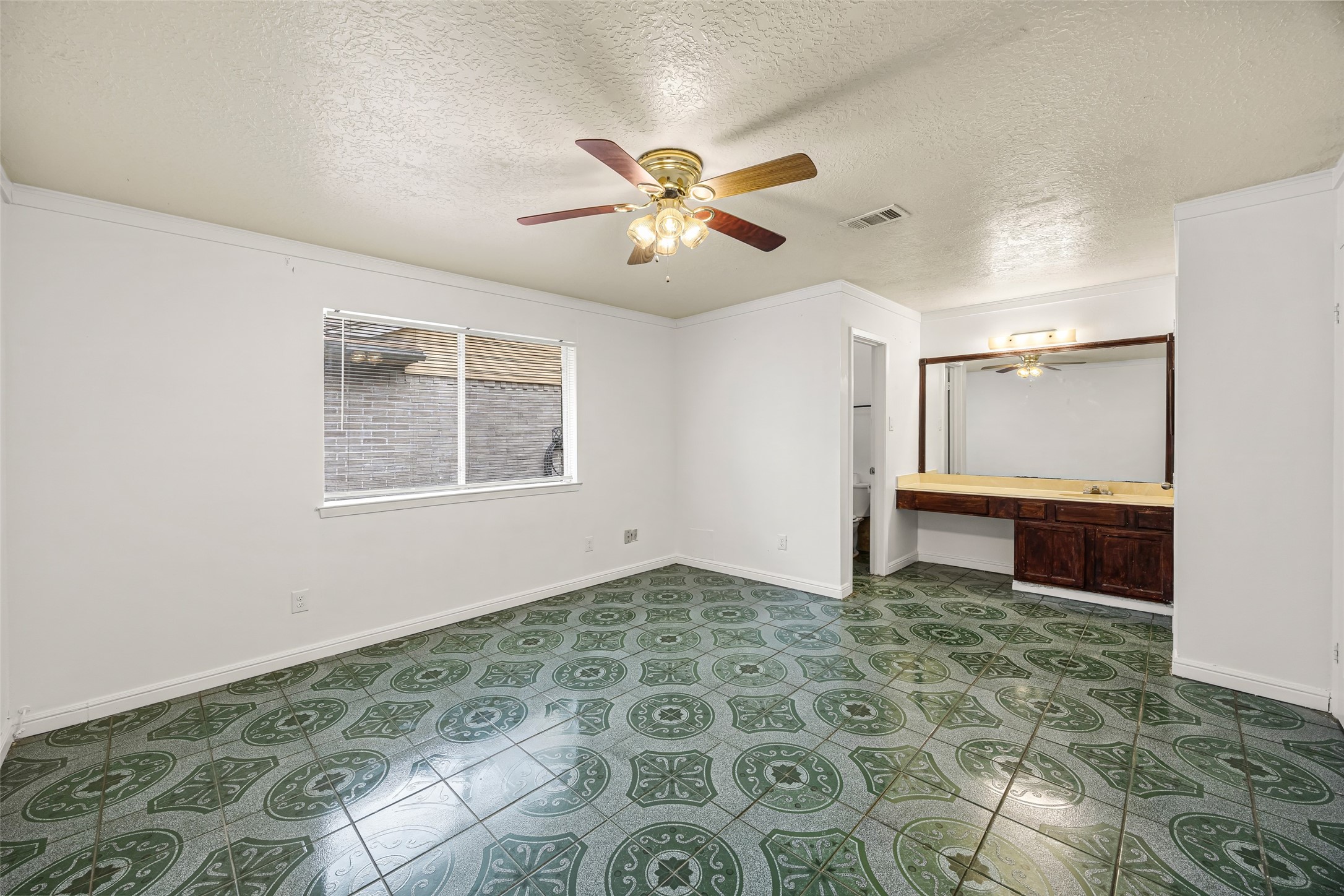 7226 Ridgeberry Drive Houston, TX 77095 - Photo 15 of 31 a view of a livingroom with a ceiling fan and window