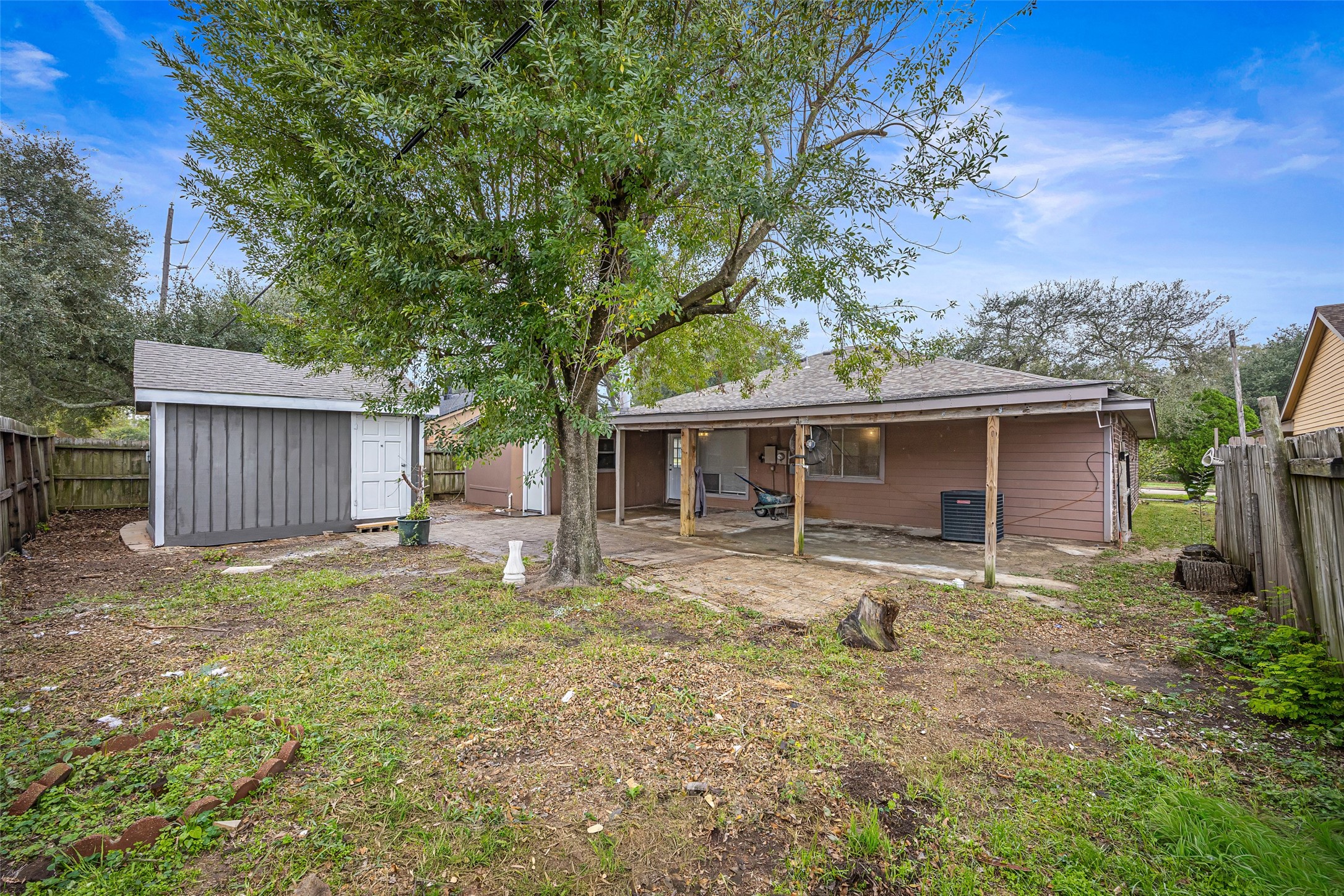 7226 Ridgeberry Drive Houston, TX 77095 - Photo 24 of 31 a house that has a tree in front of it