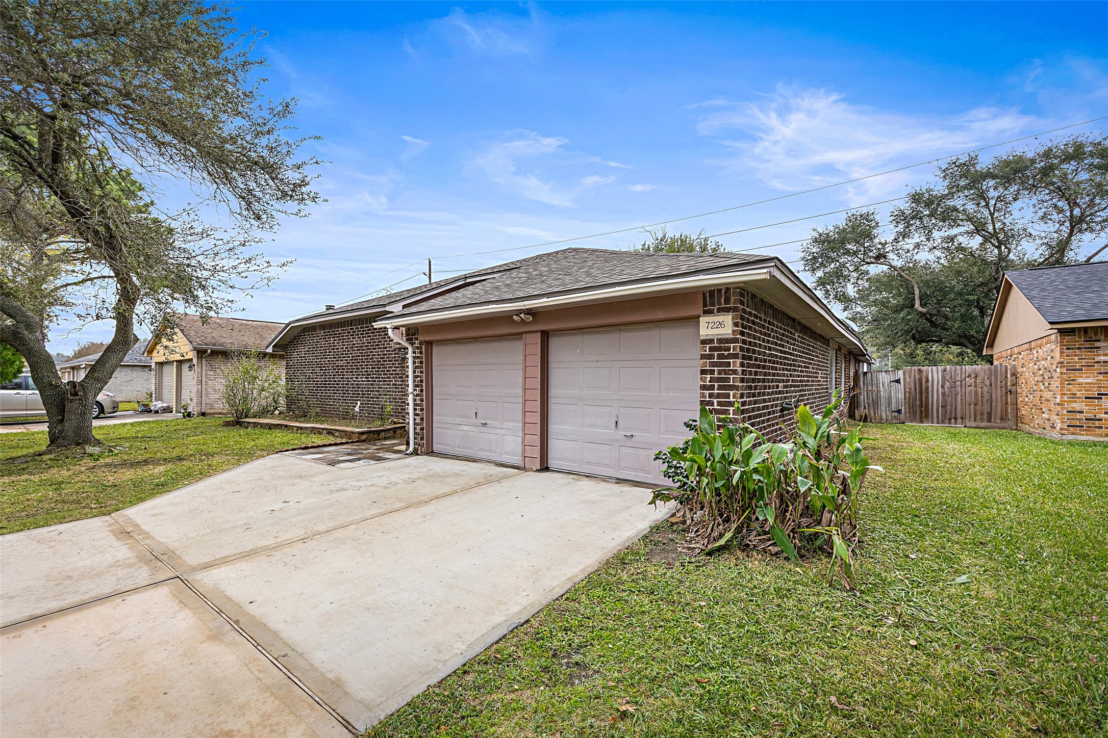 7226 Ridgeberry Drive Houston, TX 77095 - Photo 27 of 31 a backyard of a house with lots of green space