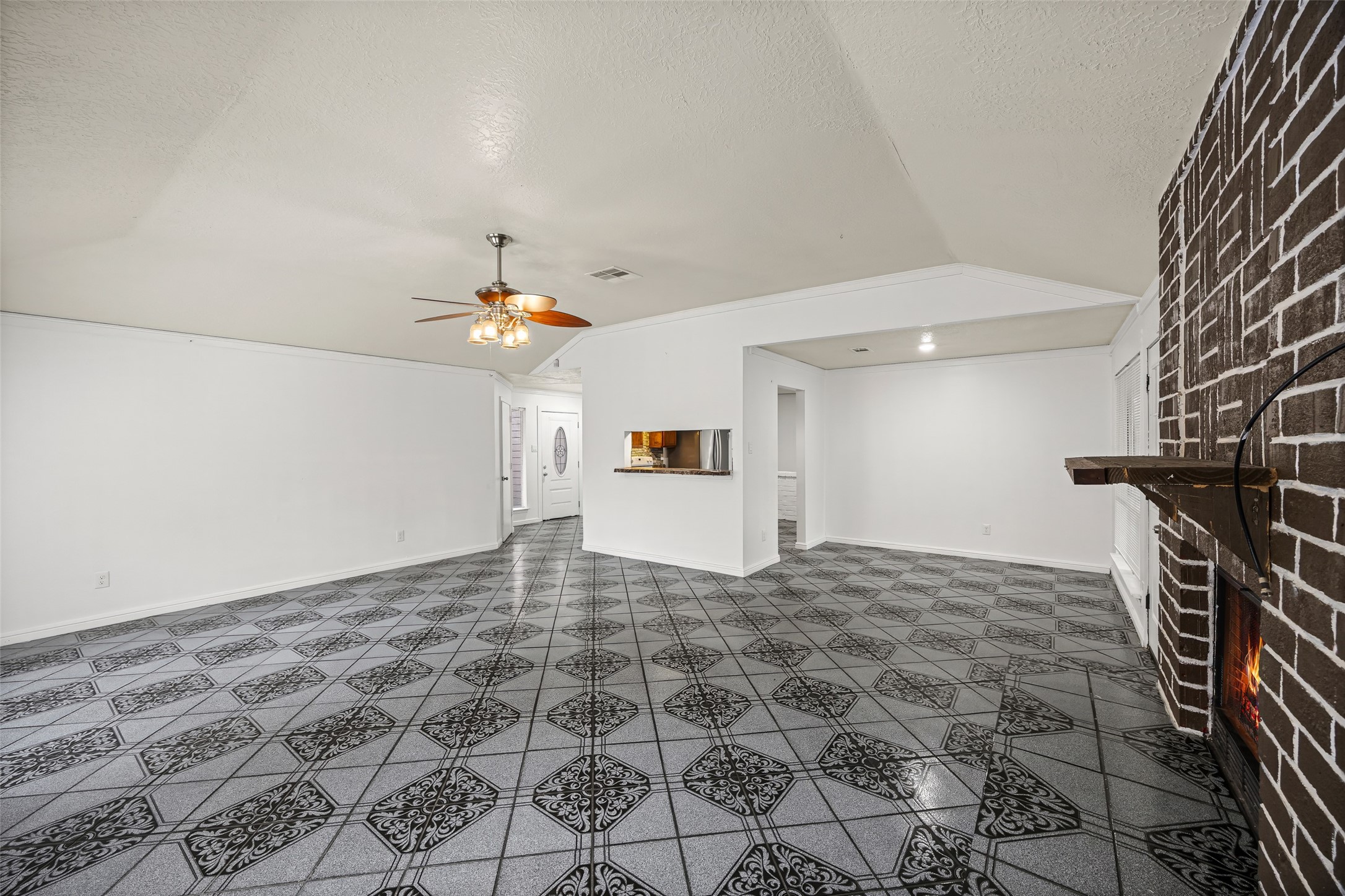 7226 Ridgeberry Drive Houston, TX 77095 - Photo 5 of 31 a bedroom with a bed and a chandelier