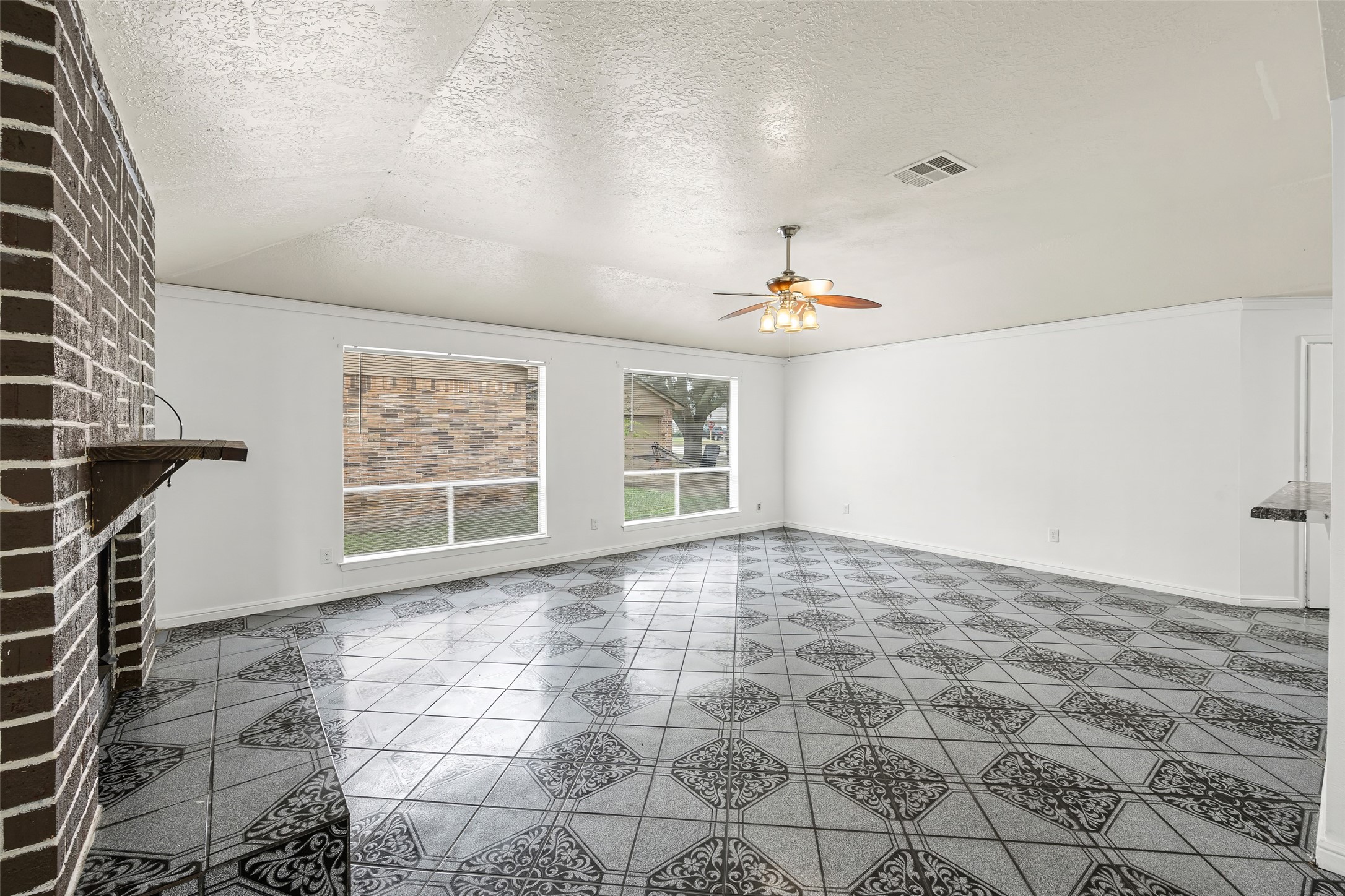 7226 Ridgeberry Drive Houston, TX 77095 - Photo 6 of 31 a view of an empty room with a window