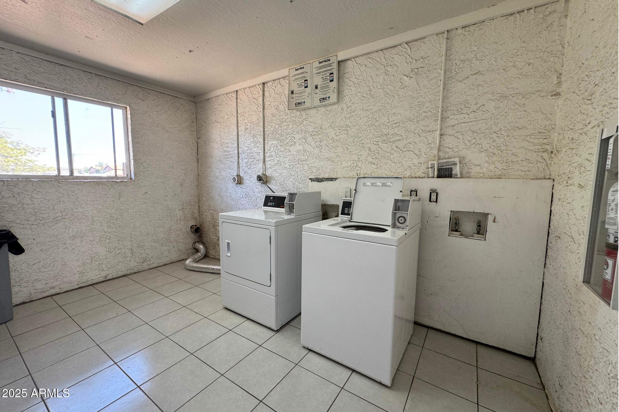 15605 North 29th Street, Unit 12 Phoenix, AZ 85032 - Photo 19 of 25 a utility room with dryer and washer