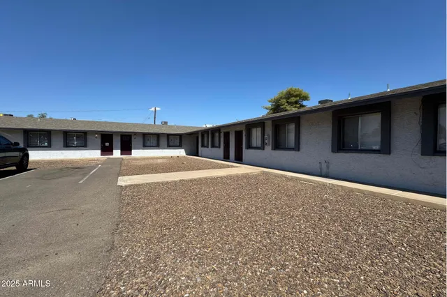 a house view with a backyard space