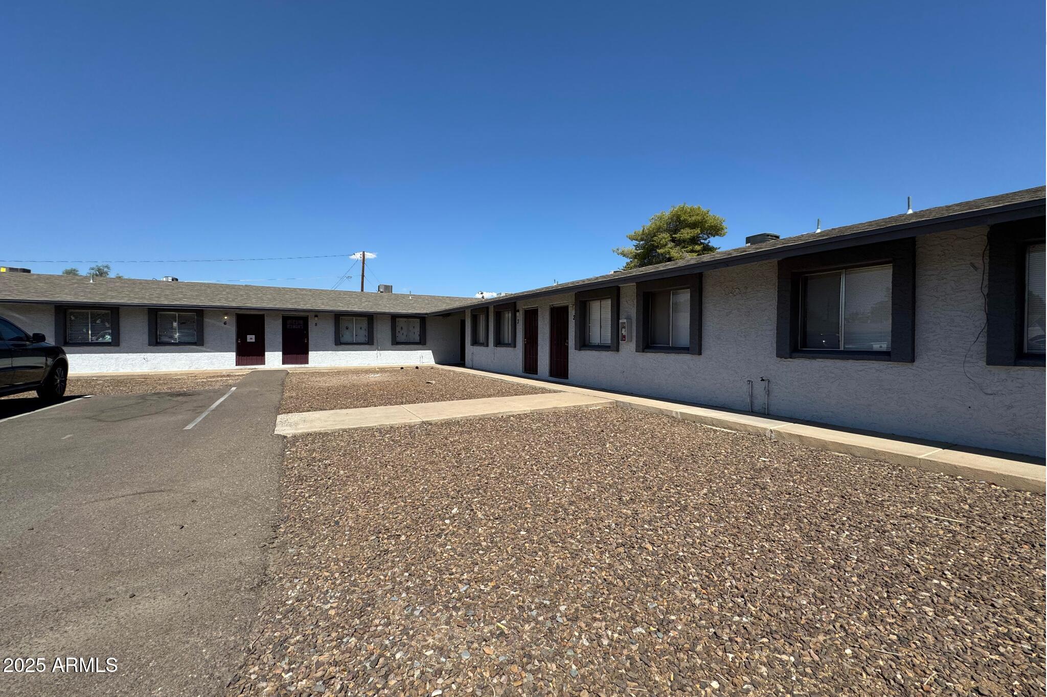 15605 North 29th Street, Unit 12 Phoenix, AZ 85032 - Photo 5 of 25 a house view with a backyard space