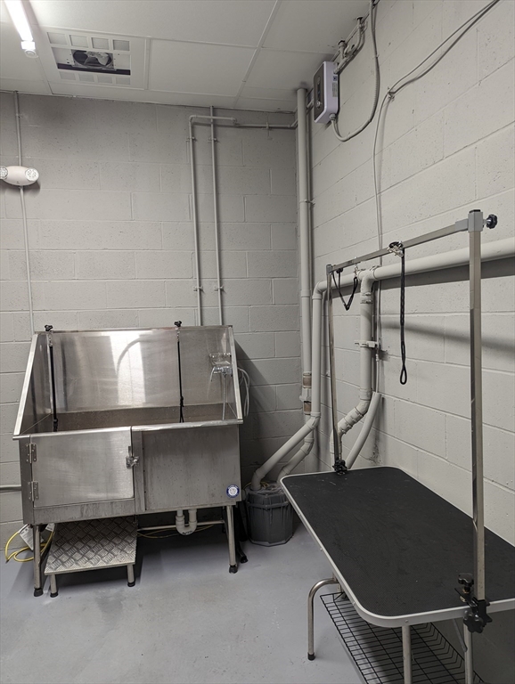 3193 Washington Street, Unit 410 Boston, MA 02130 - Photo 11 of 13 a room with gym equipment