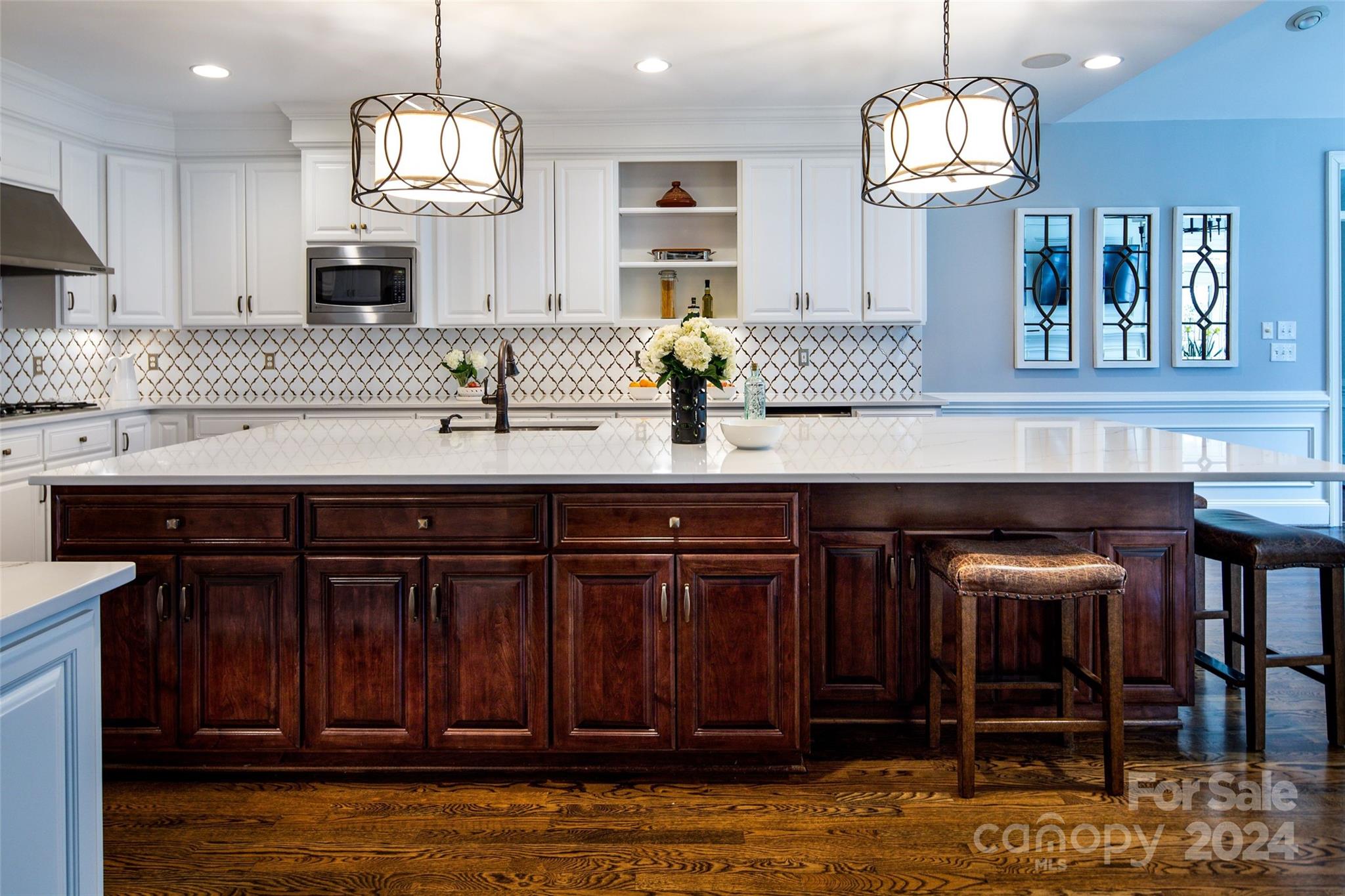 1201 Lost Oak Road Charlotte, NC 28270 - Photo 11 of 46 a kitchen with a cabinets and chandelier