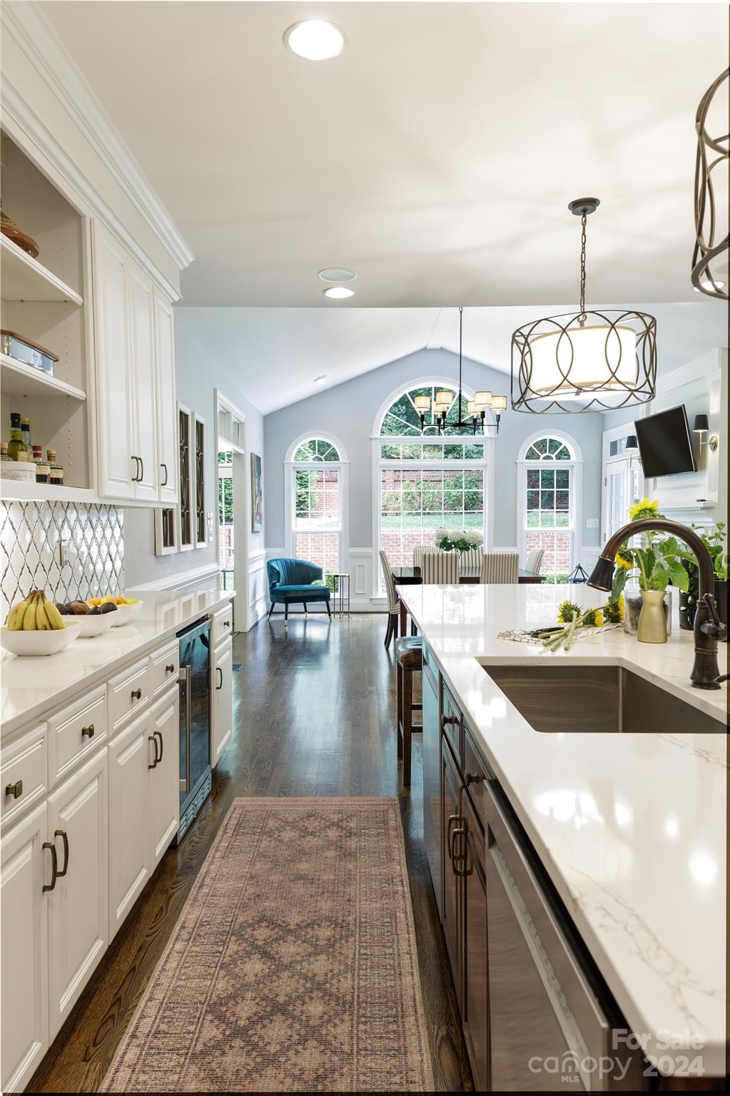 1201 Lost Oak Road Charlotte, NC 28270 - Photo 12 of 46 a kitchen with stove cabinets and living room