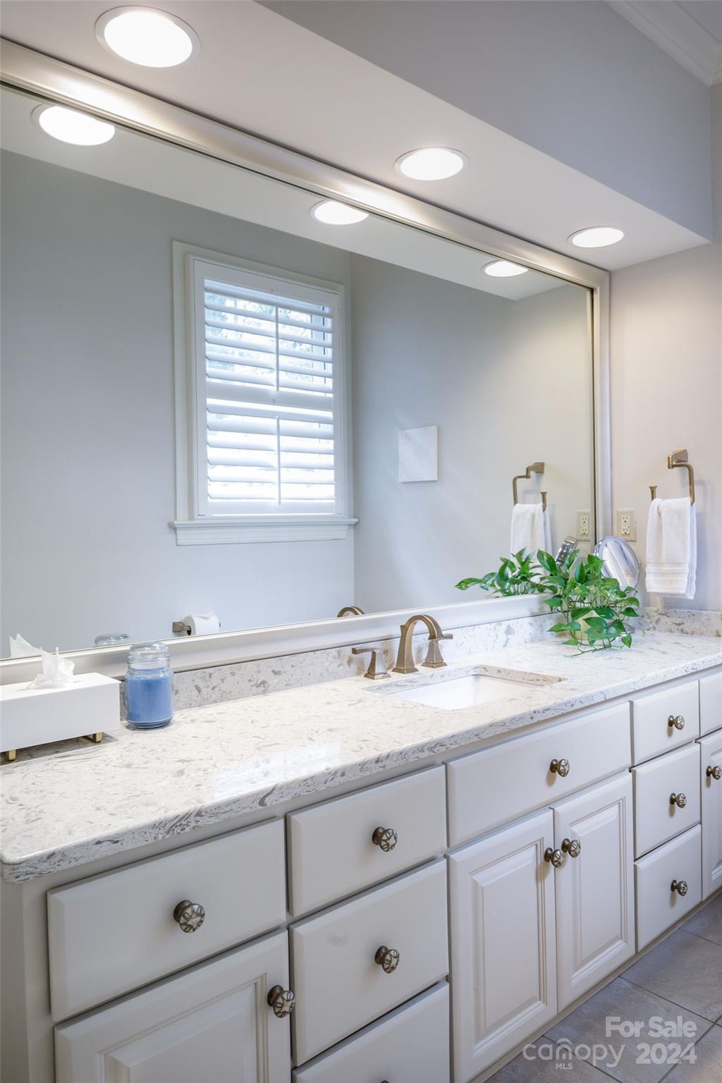 1201 Lost Oak Road Charlotte, NC 28270 - Photo 29 of 46 a bathroom with a granite countertop sink mirror and window