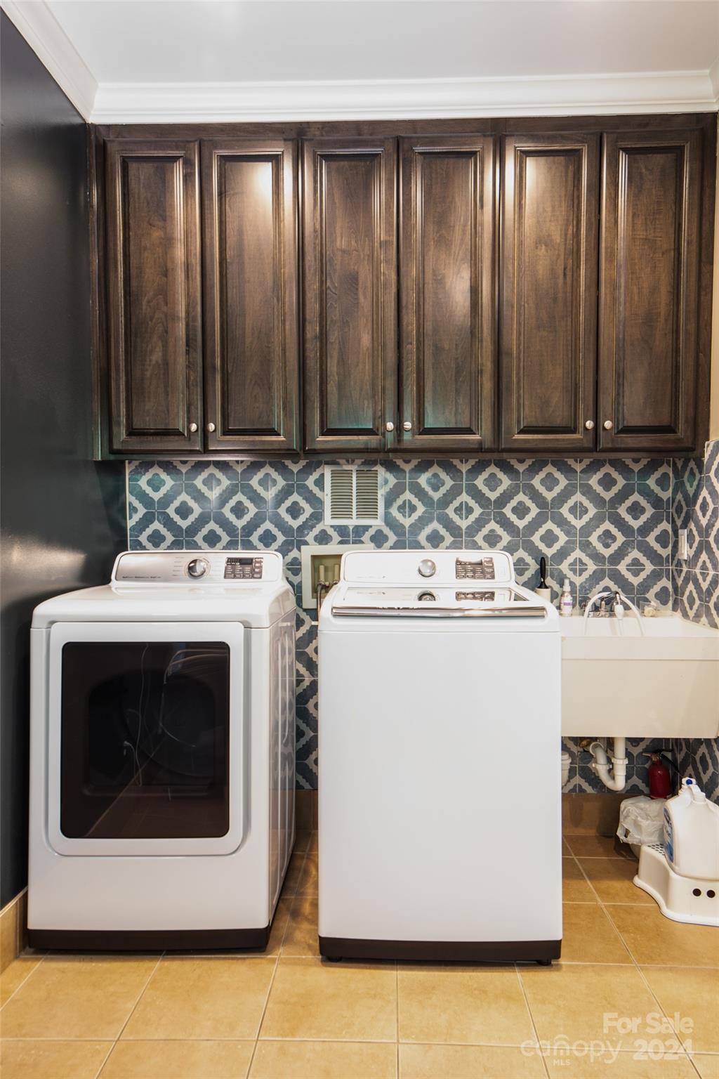 1201 Lost Oak Road Charlotte, NC 28270 - Photo 40 of 46 a bathroom with a sink and a washer dryer