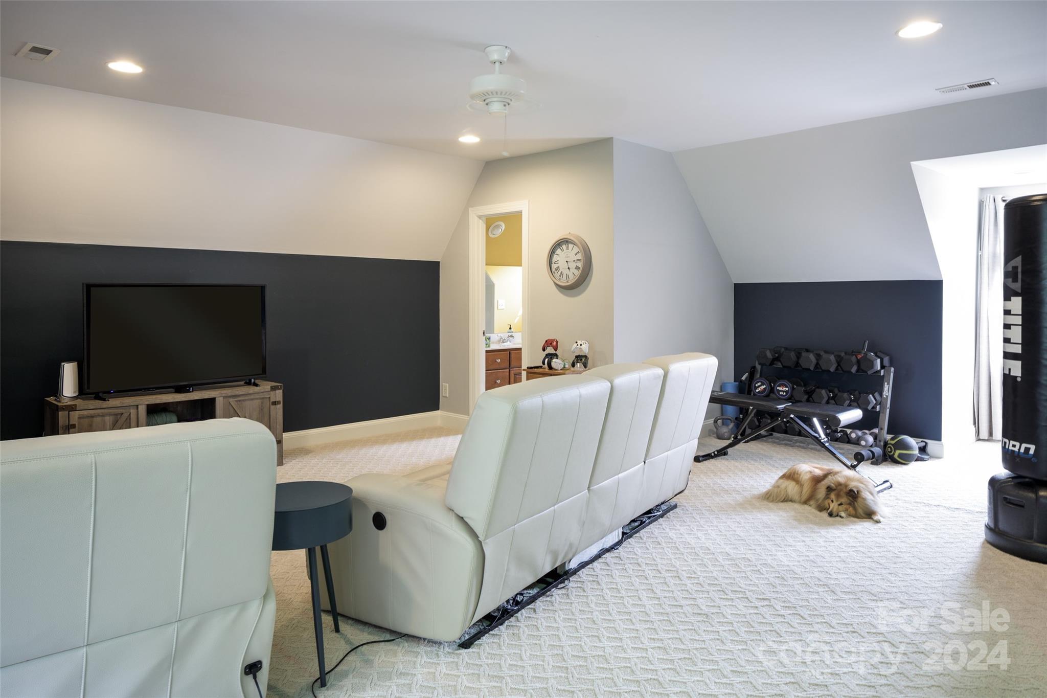 1201 Lost Oak Road Charlotte, NC 28270 - Photo 42 of 46 a living room with furniture and a flat screen tv