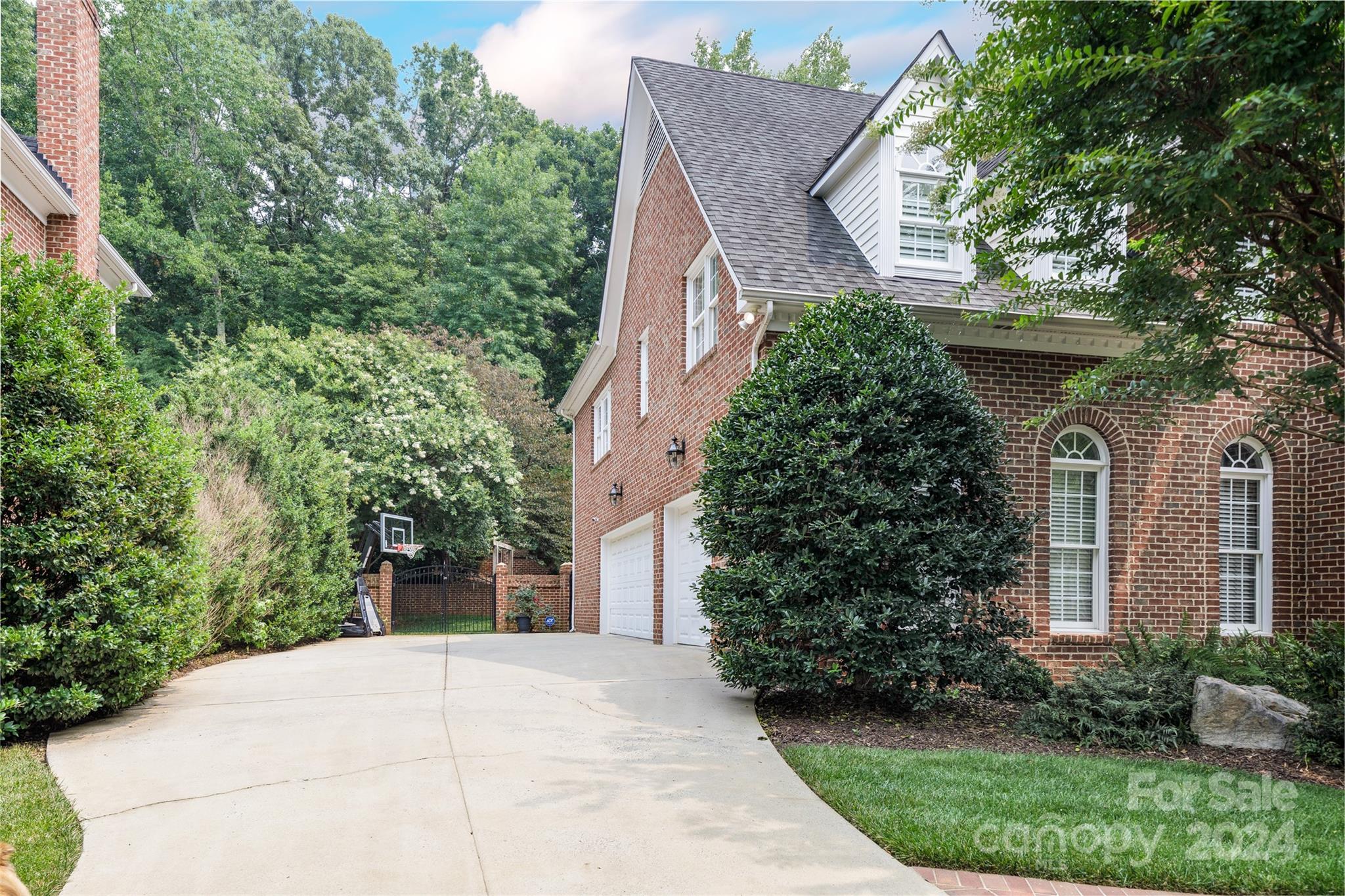 1201 Lost Oak Road Charlotte, NC 28270 - Photo 45 of 46 a front view of a house with garden