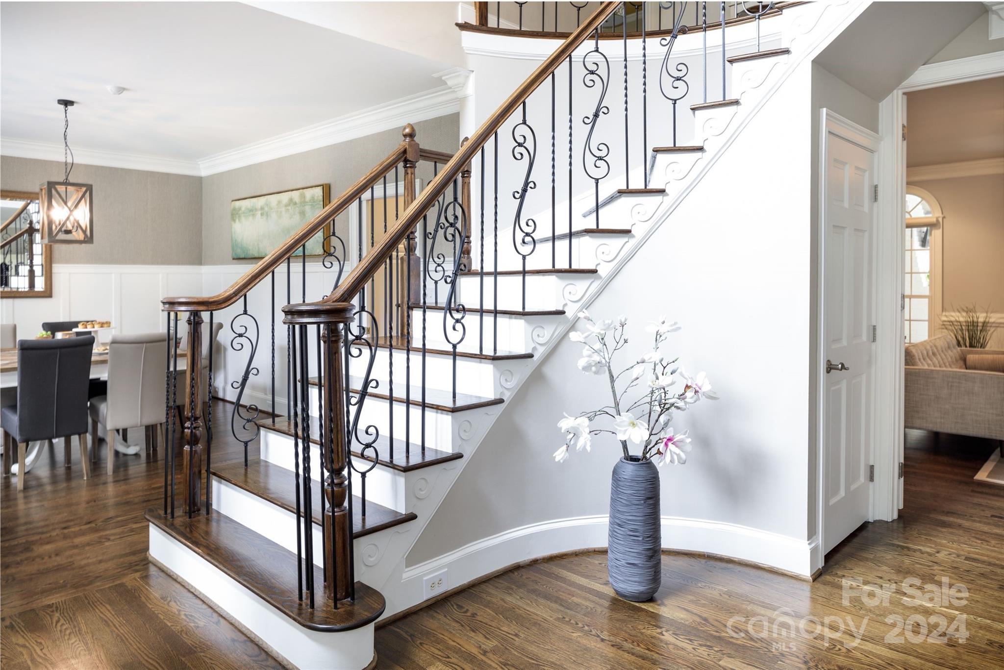 1201 Lost Oak Road Charlotte, NC 28270 - Photo 7 of 46 a view of entryway with wooden floor and stairs