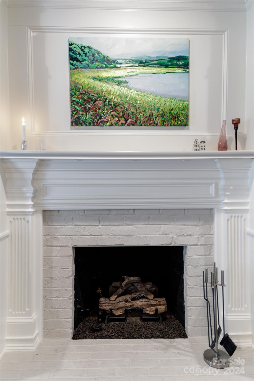 1201 Lost Oak Road Charlotte, NC 28270 - Photo 10 of 46 a living room with a fireplace and a floor to ceiling window