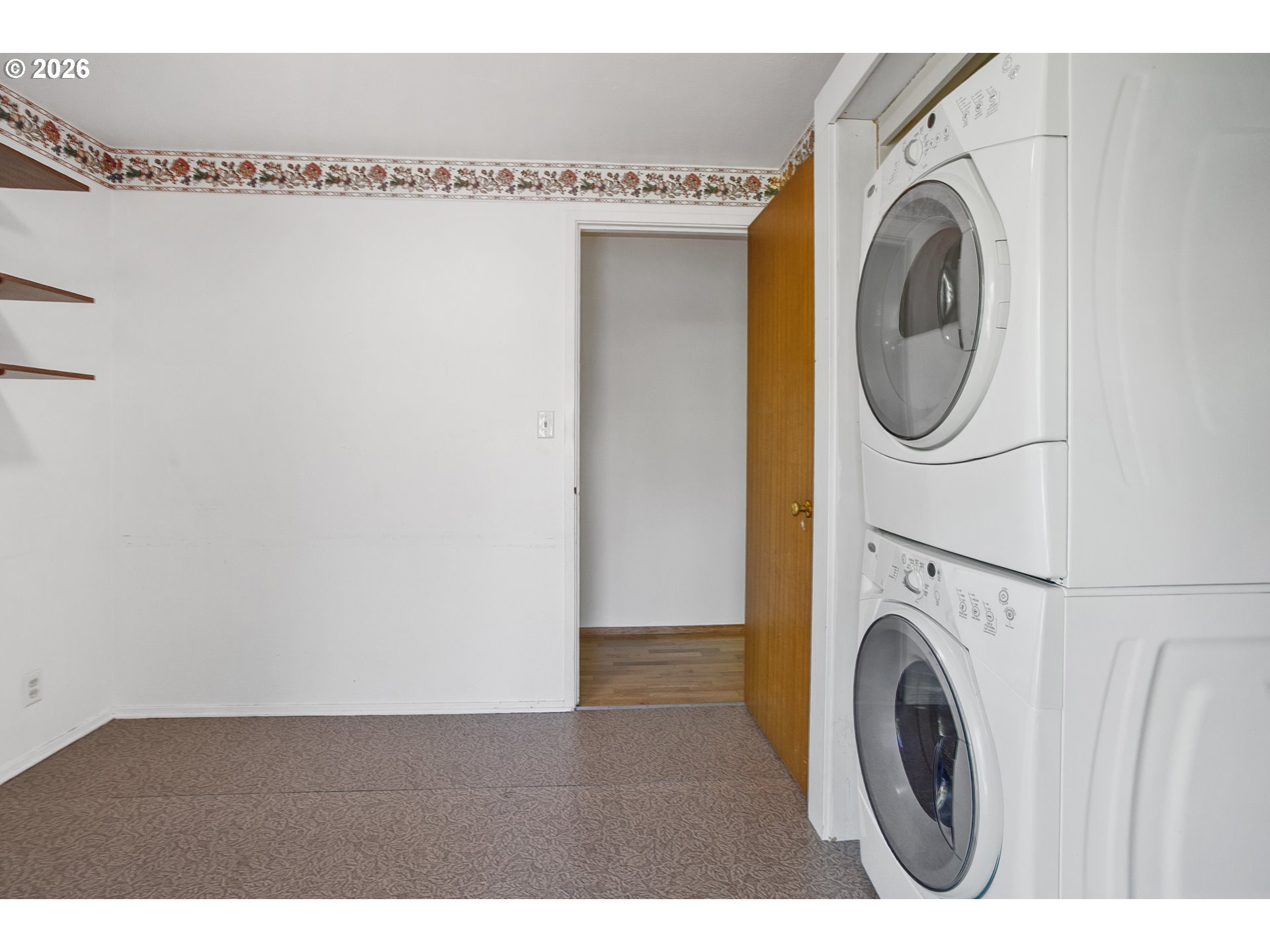 2840 Ferry Street Eugene, OR 97405 - Photo 21 of 35 a view of a washer and dryer in a utility room
