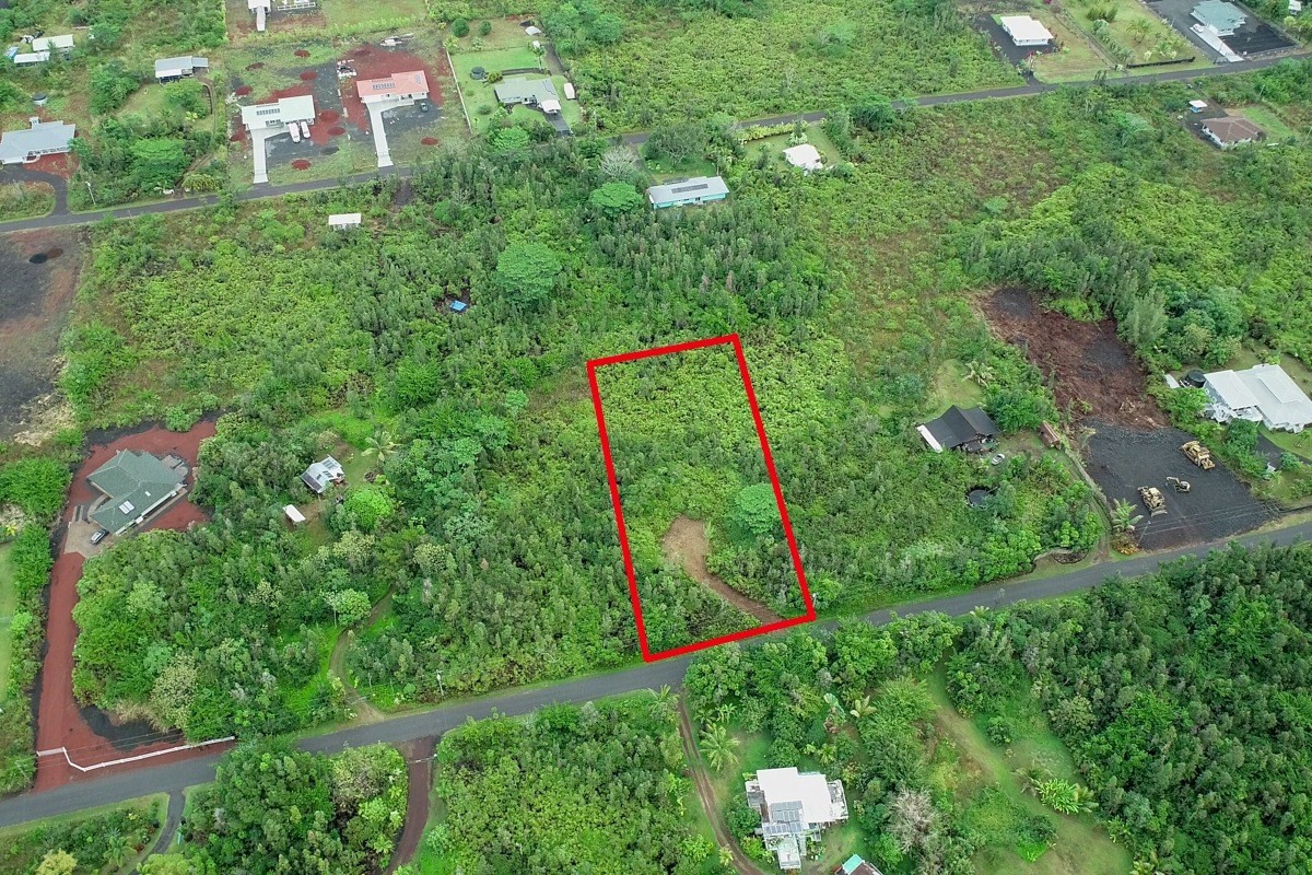 2709 Lot Avenue Keaau, HI 96749 - Photo 2 of 12 a sign that is sitting in a field