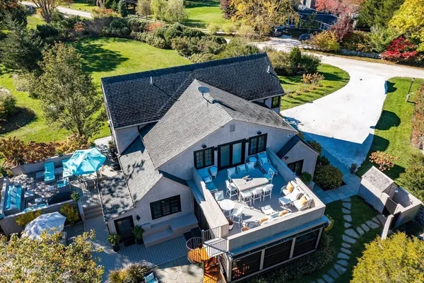an aerial view of a house having yard