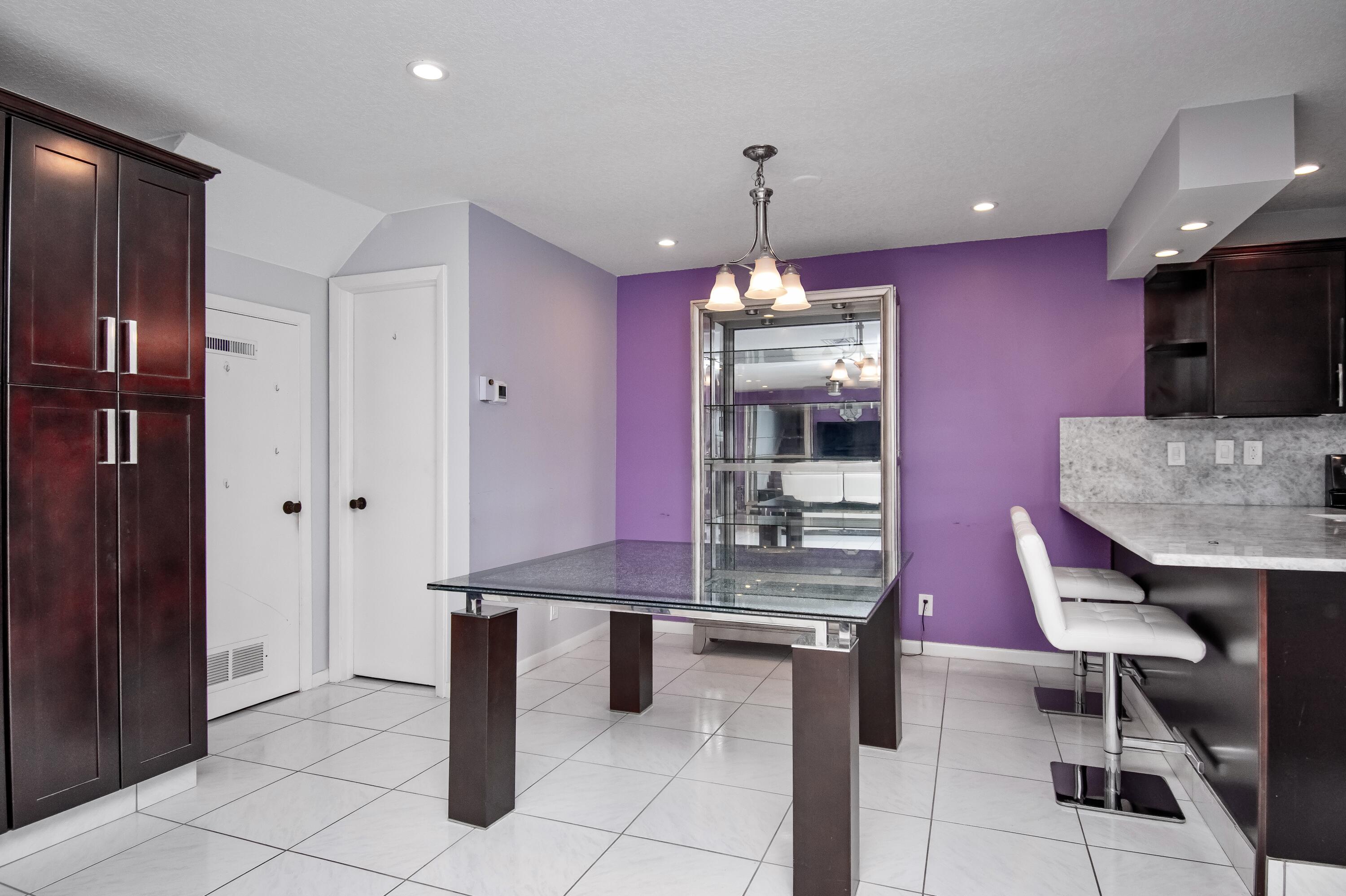 9460 Southwest 61st Way, Unit B Boca Raton, FL 33428 - Photo 11 of 31 a dining room with furniture