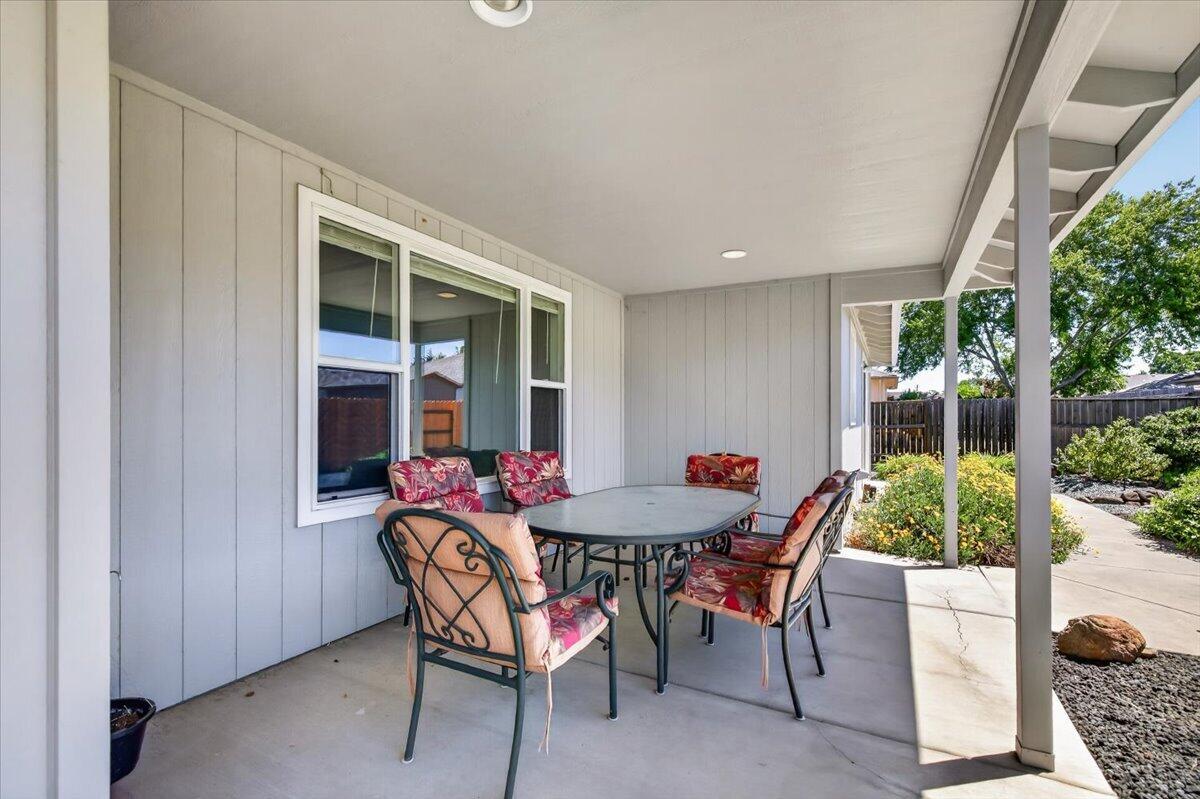 2618 Rabun Way Central Point, OR 97502 - Photo 35 of 42 a dining room with furniture and garden view