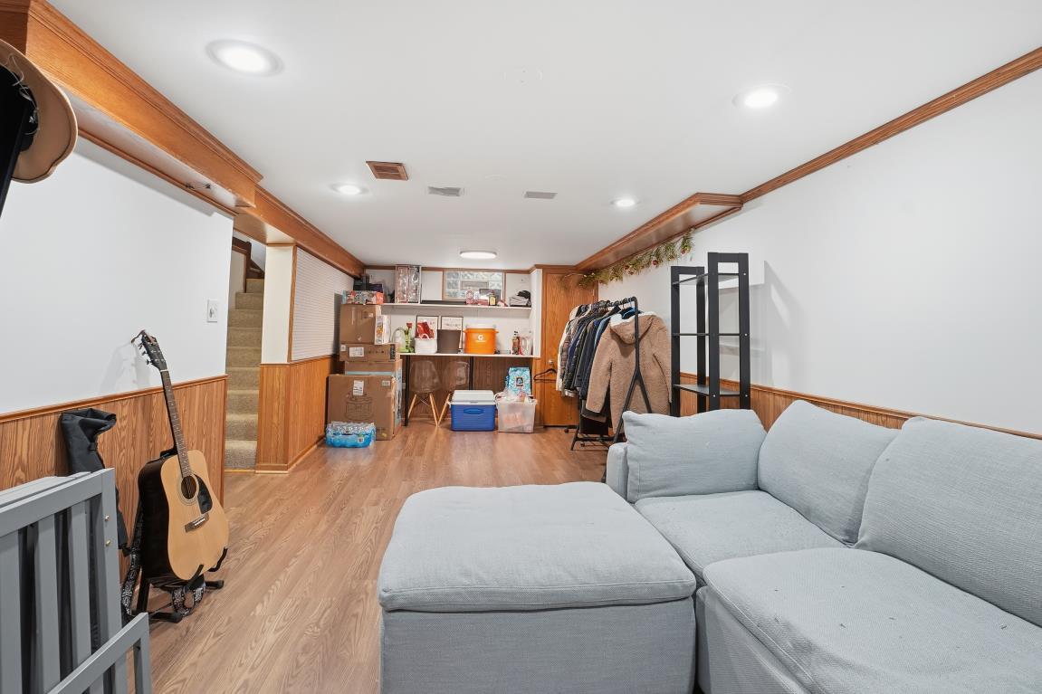 4240 Custer Avenue Brookfield, IL 60513 - Photo 20 of 28 a living room with furniture and a large window