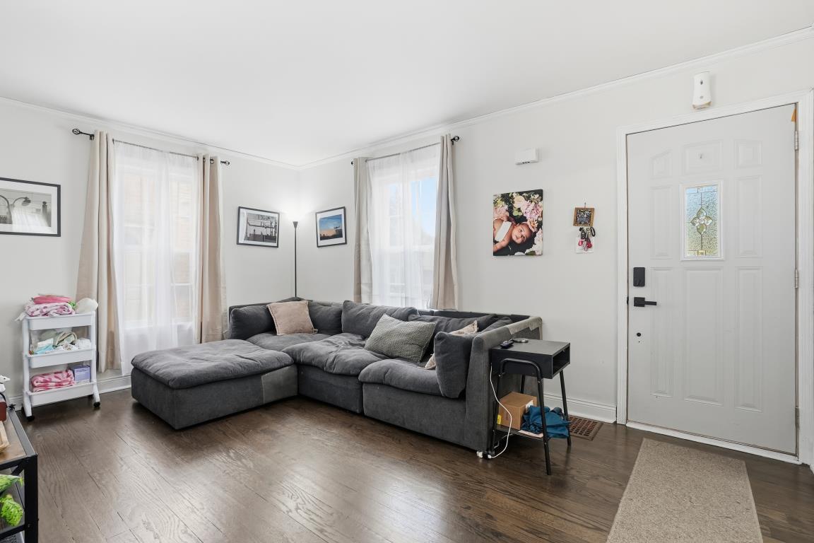 4240 Custer Avenue Brookfield, IL 60513 - Photo 4 of 28 a living room with furniture and a wooden floor