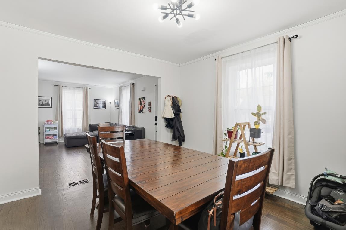 4240 Custer Avenue Brookfield, IL 60513 - Photo 7 of 28 a dining room with furniture and window