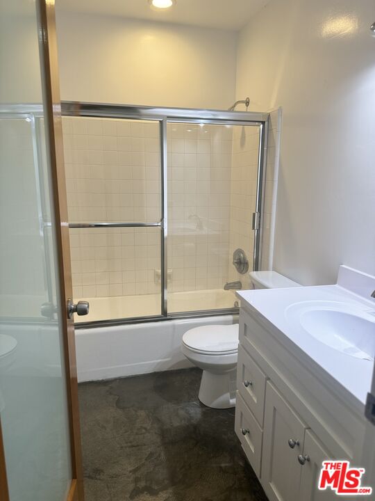 511 Rialto Avenue, Unit 1 Venice, CA 90291 - Photo 11 of 17 a bathroom with a granite countertop sink toilet and shower