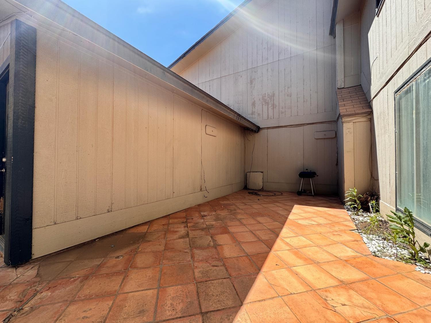 5763 38th Street Lubbock, TX 79407 - Photo 15 of 16 a view of a backyard of the house